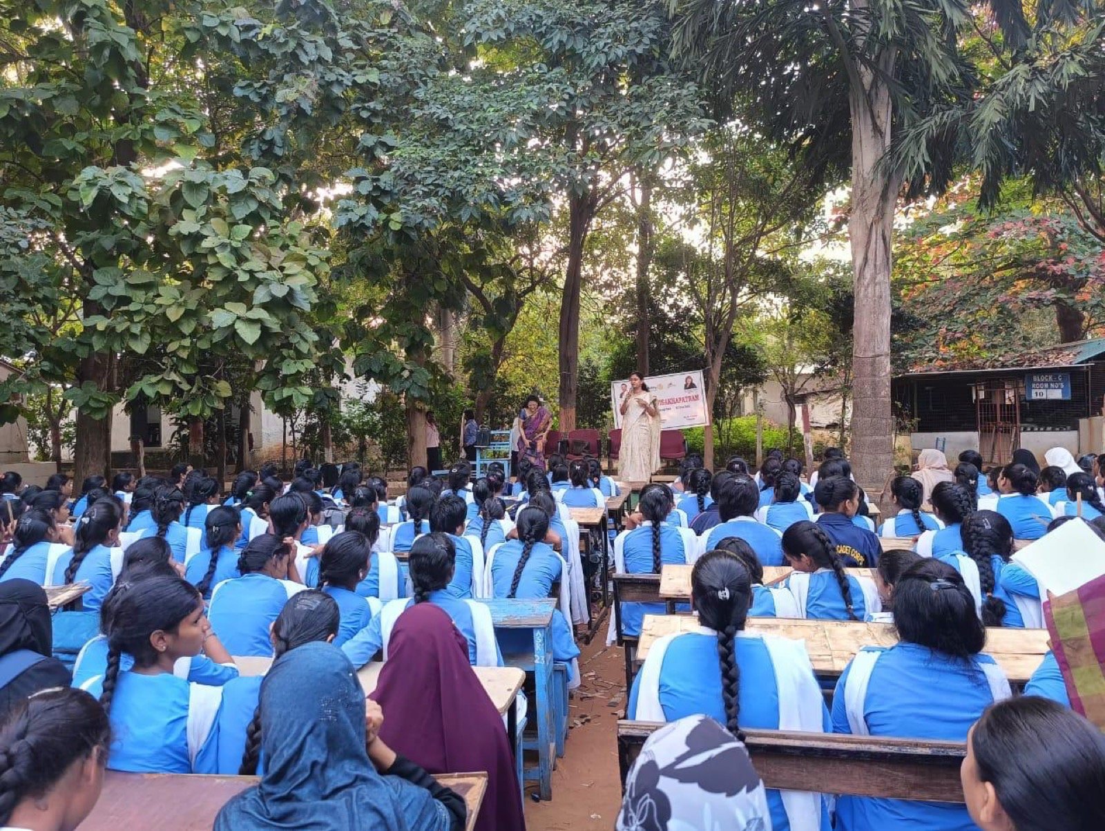 Dr. Srividya leading a health awareness session for school students