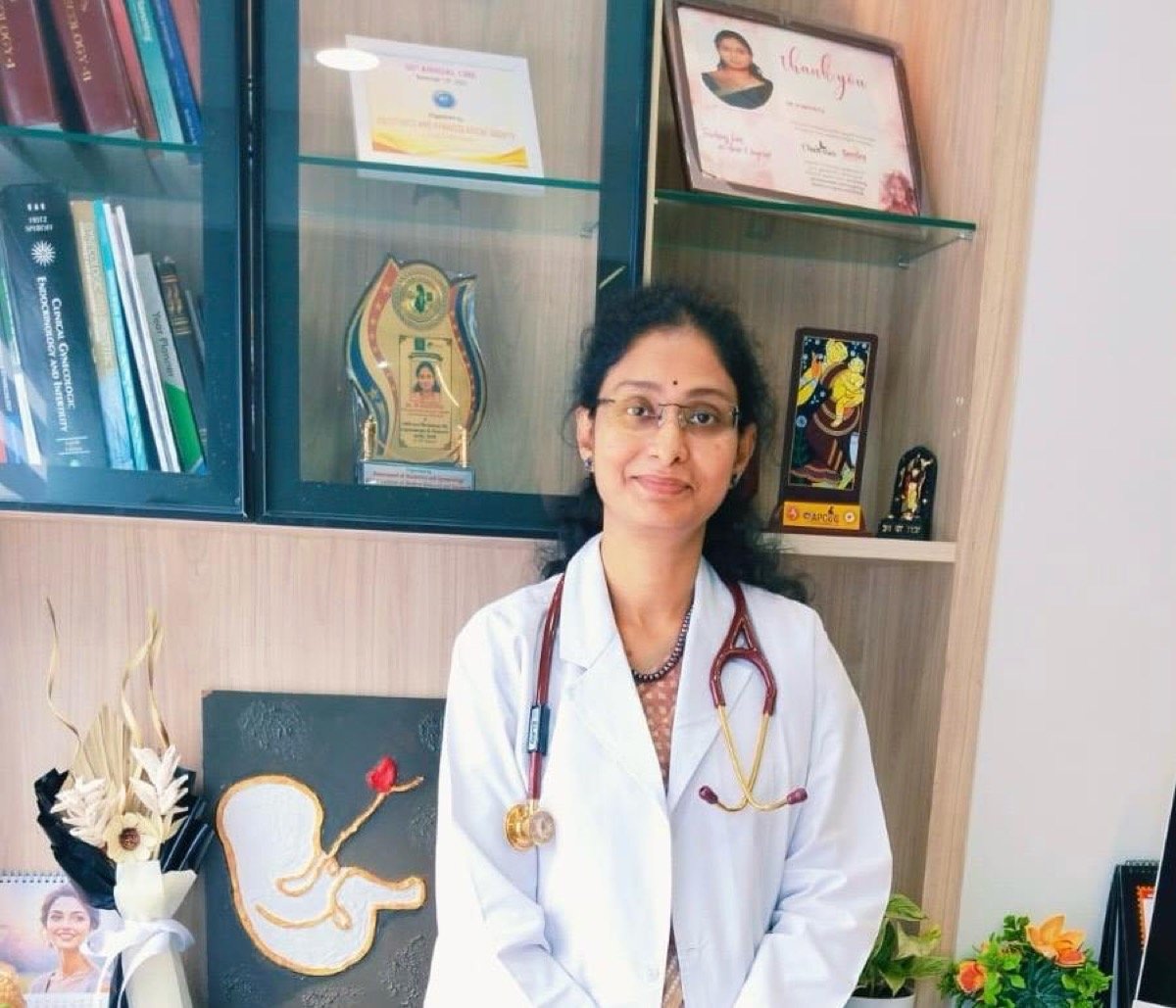 Dr. Srividya in her white coat